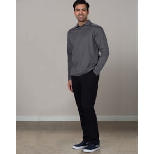 A man wearing a grey long-sleeve polo and black utility cargo pants, standing against a neutral background.