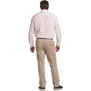 Men's chino pants in beige, viewed from the back, paired with a white button-up shirt. Features branding on the pants.