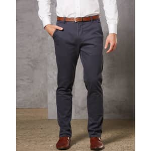 Men's navy chino pants with a slim fit, featuring side pockets and a brown belt. Pairing with brown shoes.