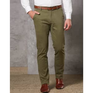 Men's Boston Chino Pants in olive green, featuring a slim fit and pockets, paired with a brown belt and shoes.