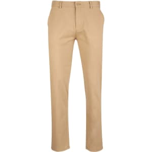 Men's chino pants in a light beige colour, featuring a button closure and pockets, with a branded logo.