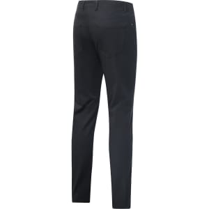 Ladies' flexi chino pants in black, featuring a slim fit and back pockets. The design includes a branding logo.