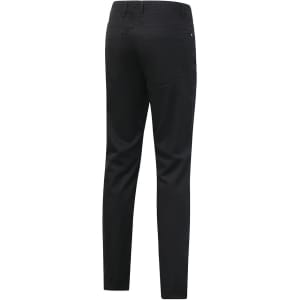 A pair of black ladies' chino pants featuring a slim fit and a flexible waistband, with a logo on the back.
