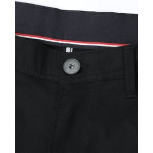 A close-up of black chino pants featuring a button and detailed waistband with a contrasting stripe.