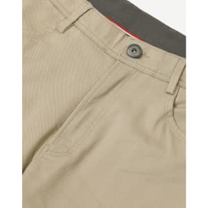 A close-up view of khaki flexi chino pants featuring a button closure and a grey waistband. The image includes a logo.