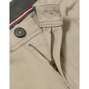 A close-up of beige chino pants featuring a zipper, button, and waistband details. The fabric has a textured finish.