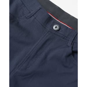Navy blue flexi chino pants featuring a button closure and a stylish waistband. The fabric appears smooth and durable.