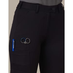 A pair of black ladies' utility cargo shorts with pockets, featuring a pen and scissors attached.