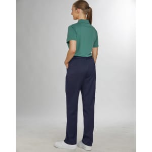 Ladies' utility cargo pants in navy blue, featuring pockets and a tailored fit. Model wears a green polo top.