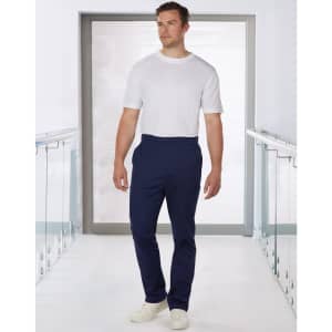 Men's solid navy scrub pants displayed on a model wearing a white shirt, featuring a sleek design and a logo.