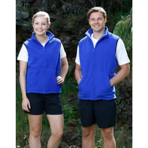 A unisex polar fleece vest in bright blue, worn by a woman and a man, each paired with a white t-shirt and shorts.