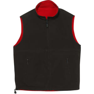 A unisex reversible vest featuring a dark exterior and a contrasting red interior. It includes two zippered pockets and a logo.