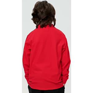 A red long sleeve polo shirt for kids, featuring a collar and a plain back design. The shirt has a logo.