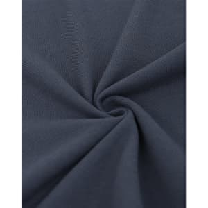 A close-up of navy cotton/poly pique fabric, showcasing the texture and drape of the material.