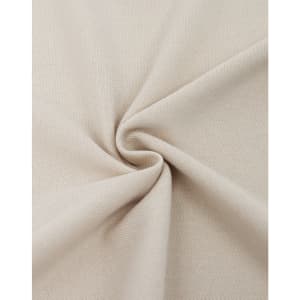 A close-up of light beige fabric, showcasing a textured cotton/poly pique weave. The fabric is folded in a spiral pattern.