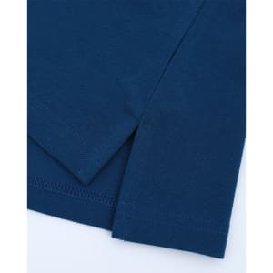 A close-up view of a navy blue cotton/poly pique polo shirt, highlighting the fabric texture and sleeve detail.
