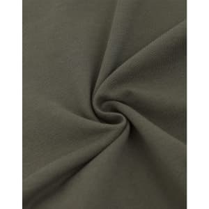 A close-up of dark olive green fabric with a soft texture, featuring a pique weave pattern.
