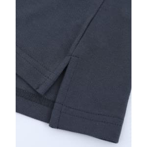 A close-up of a grey cotton/poly pique polo shirt showcasing the stitching and hem details. The shirt has a logo.