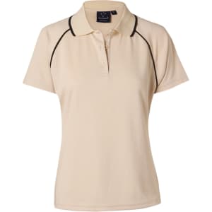 A cream ladies' polo shirt with a black trim, featuring a collar and short sleeves. Includes a branding logo.