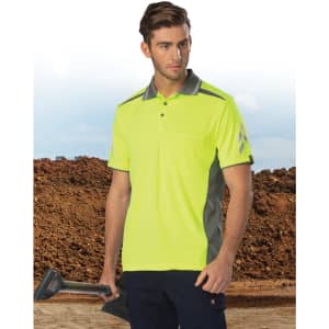 A bright yellow and grey vented polo shirt with a pocket, displayed on a model against a construction backdrop.