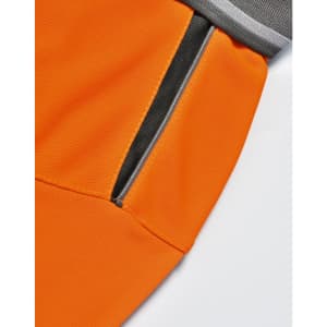 An orange polo shirt featuring a grey collar and a zippered pocket detail. The fabric has a textured finish.