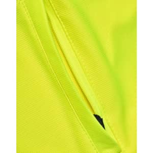 A close-up of a bright yellow polo shirt featuring a zipped pocket and a subtle logo.