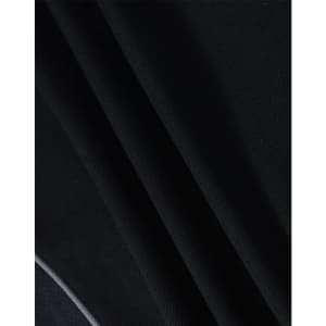 A close-up of a textured black fabric, featuring folds and draping typical of a polo shirt material.