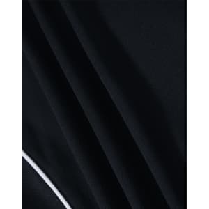 A close-up of a black polo shirt fabric with textured pattern and a contrasting white trim.