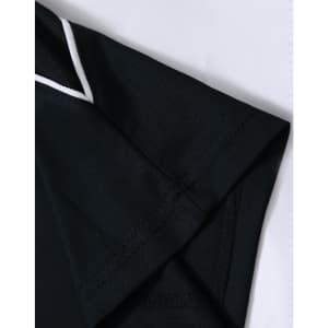 A black polo shirt with a white trim at the collar and sleeve. It features a logo on the fabric.