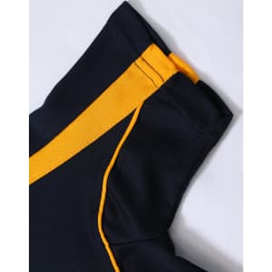 A close-up of a navy blue polo shirt with yellow detailing on the collar and sleeves, featuring a branding logo.