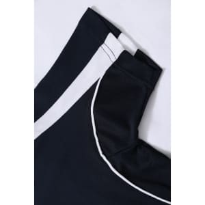A navy and white kids' polo shirt with a collar and neatly stitched details. The fabric appears lightweight and breathable.