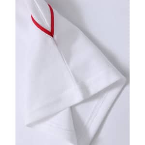 A white polo shirt featuring red accents on the sleeves and a logo.