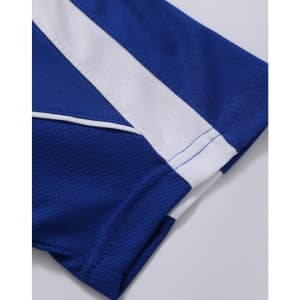 A close-up of a blue polo shirt featuring white striped detailing and a branded label.