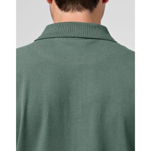 A men's cotton stretch polo shirt in a green hue, featuring a collared neckline and a back view.