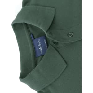 A green cotton stretch polo shirt with a classic collar and buttons, featuring a branded tag inside.