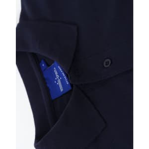 A navy blue men's cotton stretch polo shirt with a folded collar and a label visible inside.