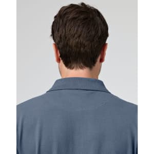 A men's cotton stretch polo shirt in a blue shade, featuring a collar and logo on the back.