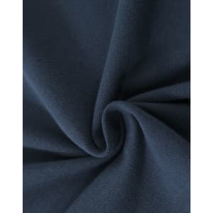 A close-up of navy cotton fabric with a stretch texture, showcasing its softness and weave.