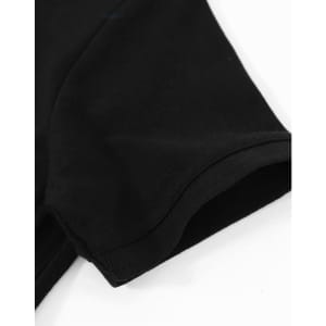 A close-up of a black cotton stretch polo shirt featuring a short sleeve and a rounded hem.
