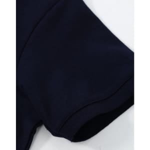 A navy blue ladies cotton stretch polo with a close-up view of the sleeve. It features a logo.