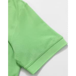 A green polo shirt featuring a pique texture, showcasing the collar and sleeve detail with a logo.