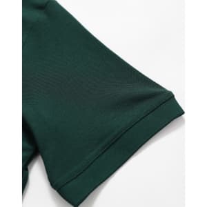 A close-up of a dark green polo shirt sleeve featuring a logo. The fabric appears smooth and lightweight.