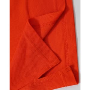 An orange Men's Truedry Pique Polo shirt, highlighting the fabric texture and seams. It features a logo.