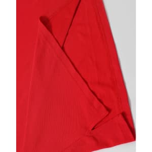 A red Men's Truedry Pique Polo shirt, showcasing its smooth fabric and detailed stitching. The shirt has a logo.
