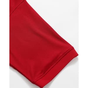 A close-up of a red polo shirt sleeve featuring a smooth fabric texture and a neatly finished hem.