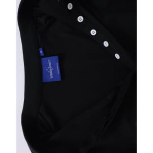 A black ladies' polo shirt featuring a collared neck and button details. It includes a label inside the collar.