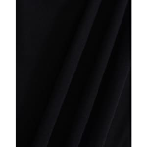 A close-up of a black fabric with a textured surface, featuring folds and draping. The image showcases the material's quality.