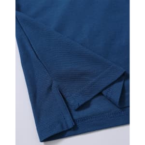 A close-up of a dark blue polo shirt featuring a folded hem and sleeve detail. The shirt has a subtle texture and branding.