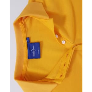 A yellow polo shirt featuring a collar, buttons, and a branded tag inside the neck.