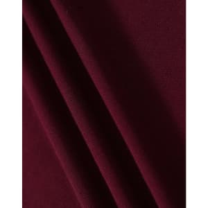 A close-up of maroon fabric, showing a textured weave with draped folds.